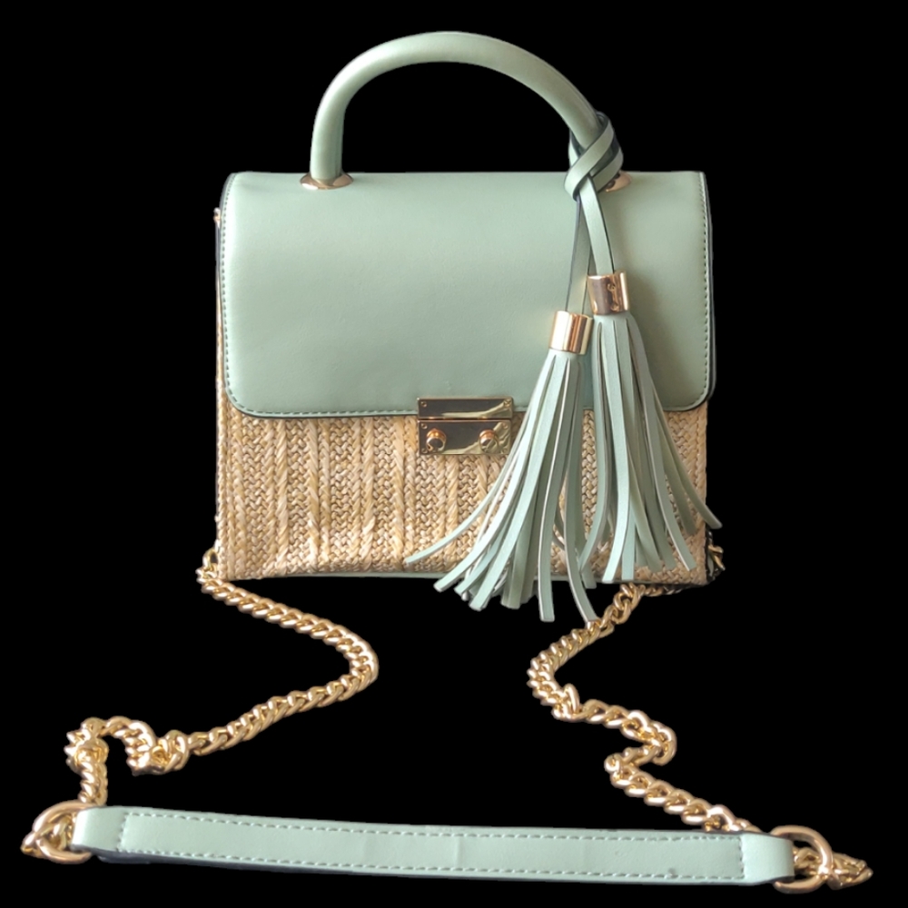 Mint green top handle crossbody/handbag with removable strap.